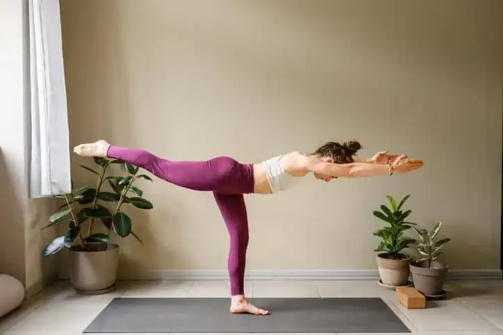 Woman doing Yoga exercise Broxburn to help with toning the body. 