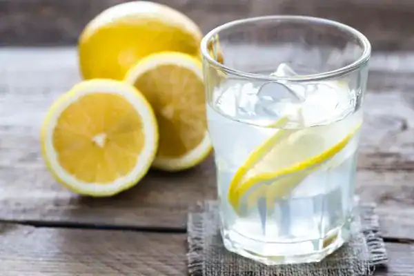 Hydration: The Secret Ingredient for a Toned Stomach and Enhanced Fitness 2 Image of lemon water to aid hydration Broxburn